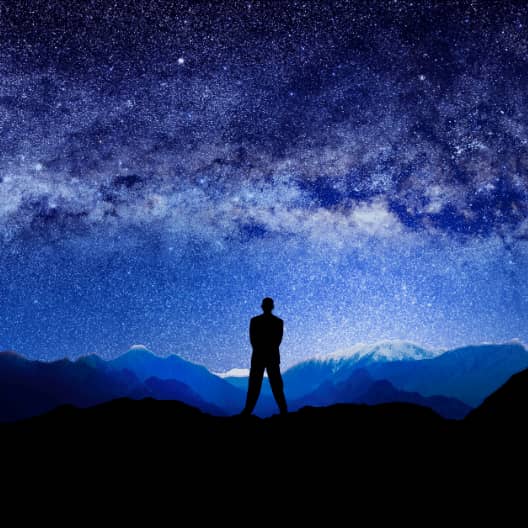 Man_in_front_of_a_galaxy_540x